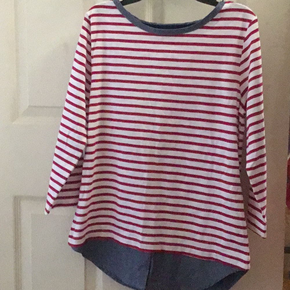 Striped red and white shirt.